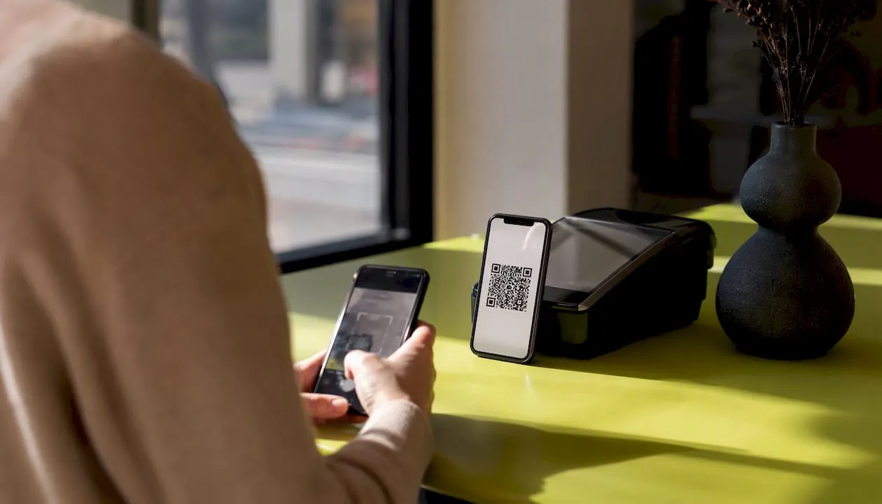 Smartphone showing QR code for reviews