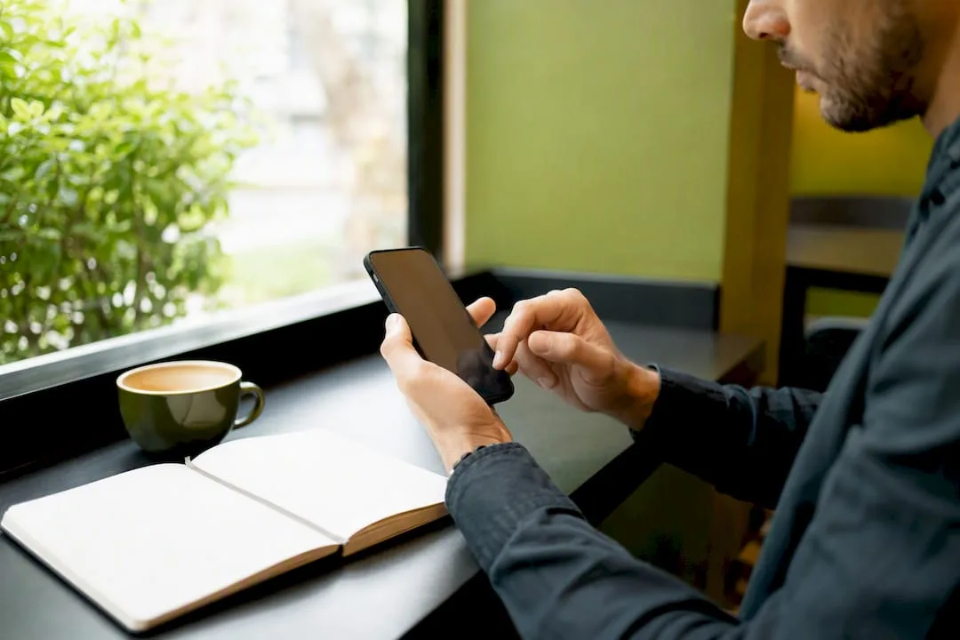 Hands adjusting call routing settings on phone panel